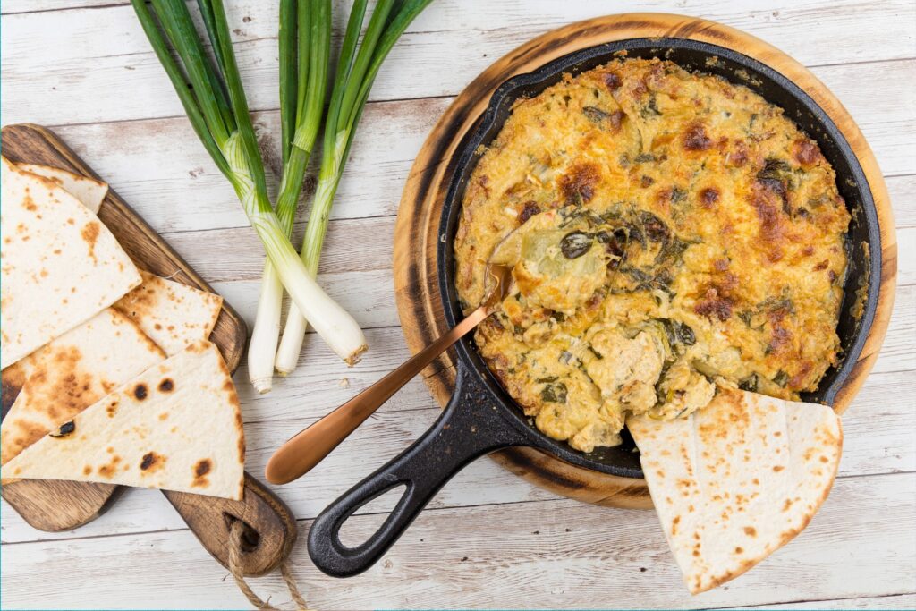 Spanac și anghinare în sos de brânze